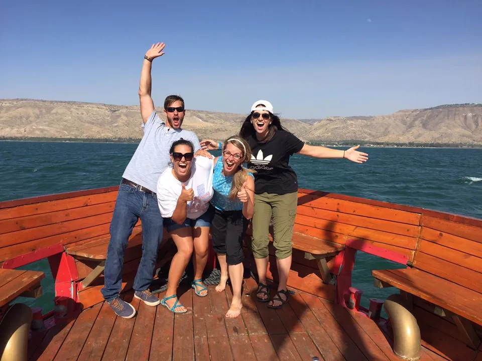 Summer program students on a boat in the Sea of Galilee
